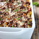 Baked Ziti is a great family meal to bring to the table with 3 kinds of cheese, a hearty meat sauce and a cheesy browned top!