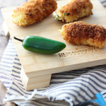 Jalapeno popper chicken is a fun way to snack with cream cheese, bacon bits and jalapenos stuffing in a crispy breaded chicken!