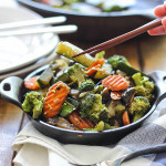 Hibachi vegetables in a cast iron bowl.