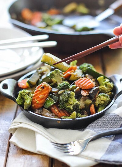 Hibachi vegetables in a cast iron bowl.