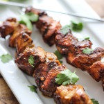 A savory and sweet marinade and baste makes these easy honey garlic chicken skewers perfect for cookouts!