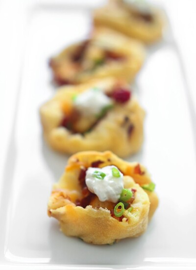 Make a great appetizer with these loaded potato pinwheels. Made form frozen crescent rolls, leftover mashed potatoes, bacon bits and cheese!