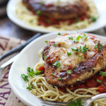 This skillet chicken Parmesan is ready under 30 minutes. With Parmesan herbed breading served with mozzarella cheese and marinara sauce.