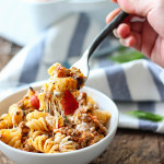 A cheesy hot Italian pasta bake with a spiced savory and sweet marinara sauce, hot Italian flavors and plenty of cheese.