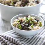 Some slow cooker mushroom risotto in a white bowl.