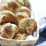 Love garlic knots? Make these easy Parmesan garlic knots at home with a simple cheat! Ready in under 30 minutes.