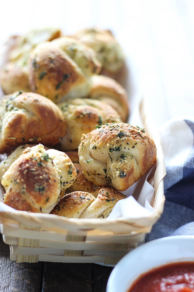 Love garlic knots? Make these easy Parmesan garlic knots at home with a simple cheat! Ready in under 30 minutes.