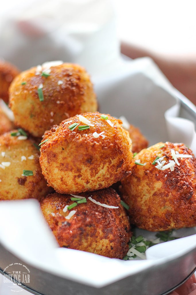 Loaded mashed potato balls so crispy on the outside but soft, fluffy and creamy on the inside. Impress your guests at potlucks, parties and holiday dinners!