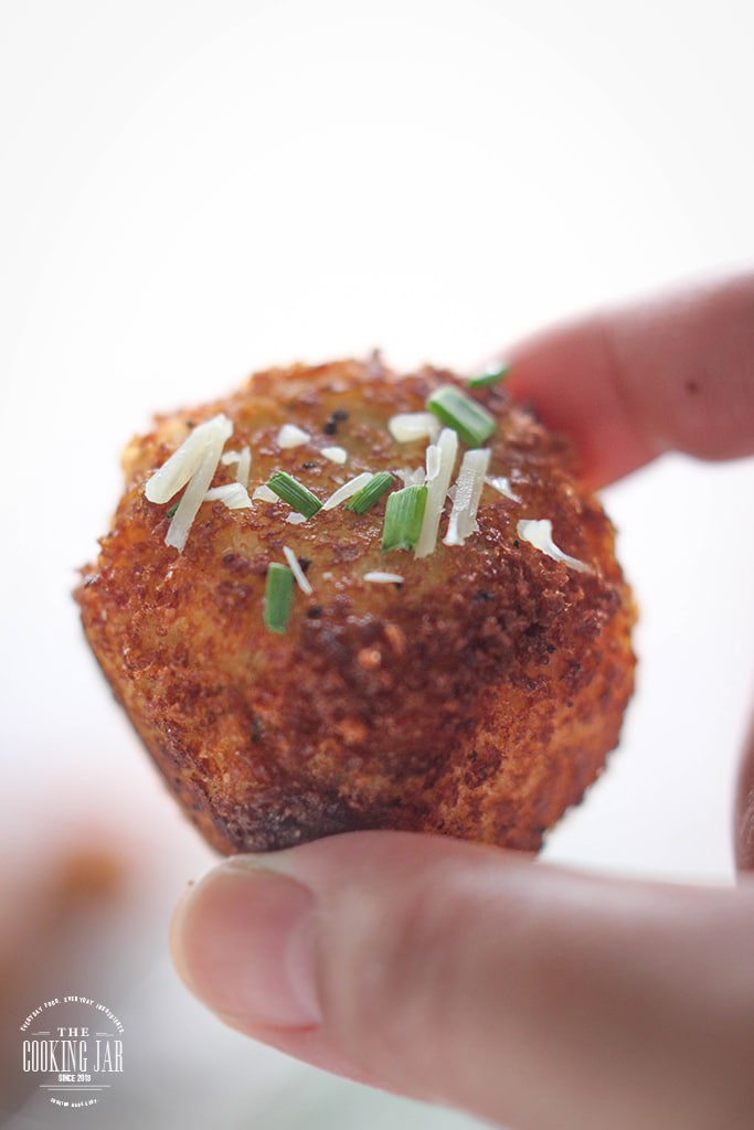 Loaded mashed potato balls so crispy on the outside but soft, fluffy and creamy on the inside. Impress your guests at potlucks, parties and holiday dinners!