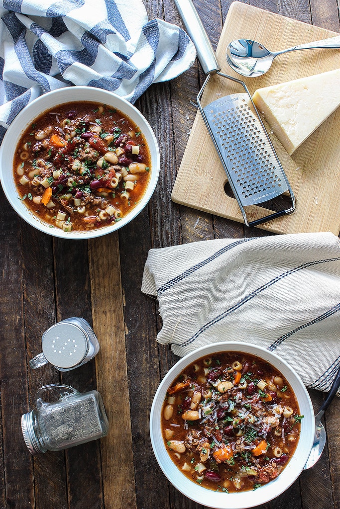 Some pasta e fagioli in two white bowls.