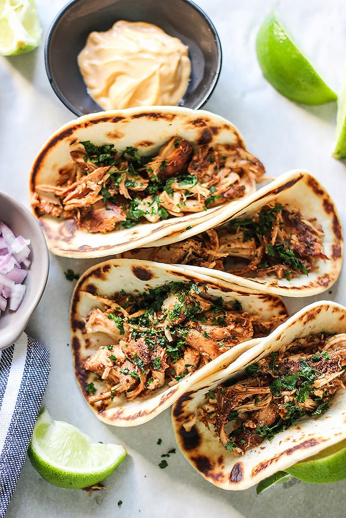 Set and forget these slow cooker shredded chicken tacos then enjoy fork-tender, authentic tasting, flavorful chicken. Pair it with your favorite toppings!