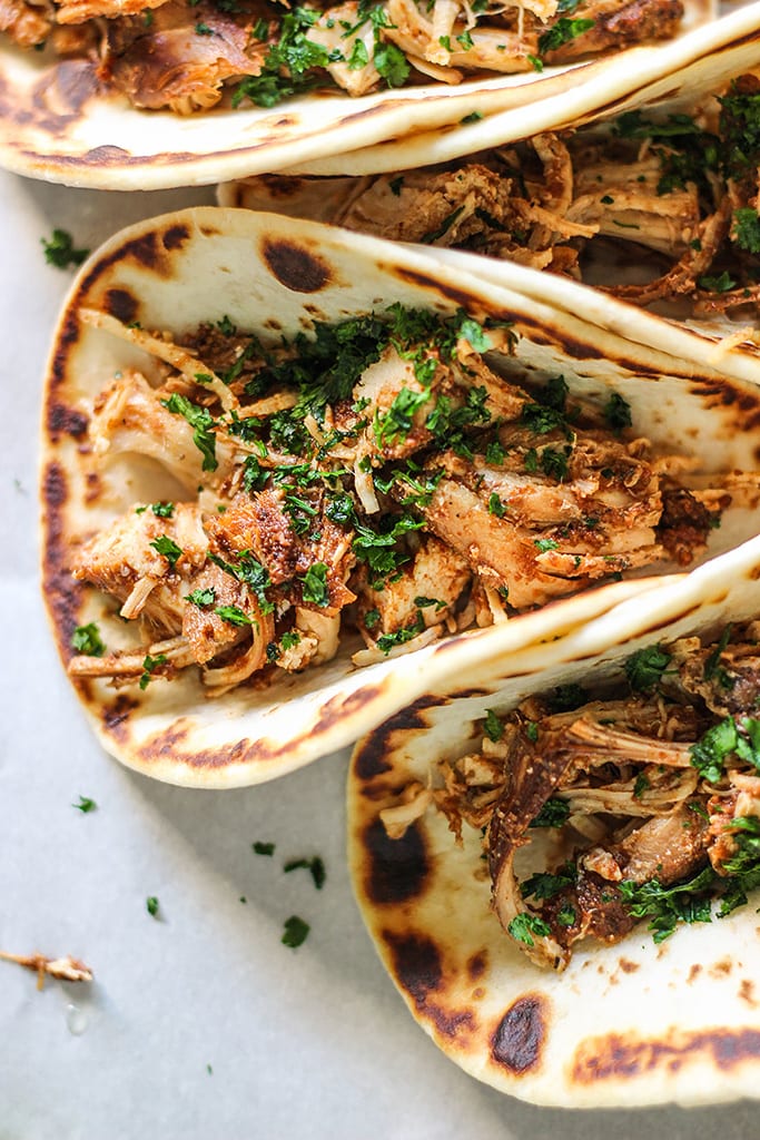 Set and forget these slow cooker shredded chicken tacos then enjoy fork-tender, authentic tasting, flavorful chicken. Pair it with your favorite toppings!