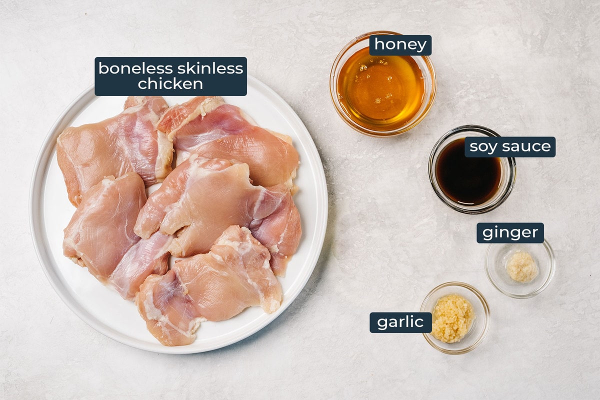 Ingredients to make honey garlic chicken in prep bowls.