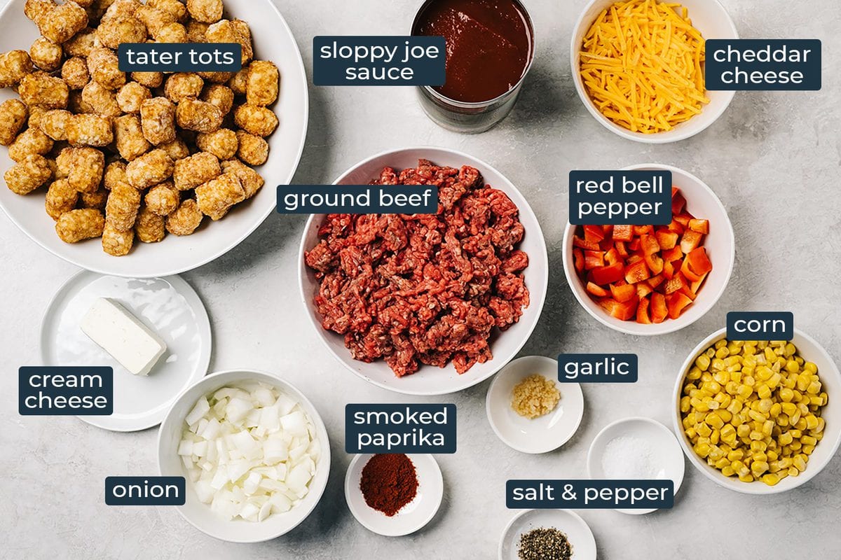Ingredients in individual bowls to make sloppy Joe tater tot casserole.