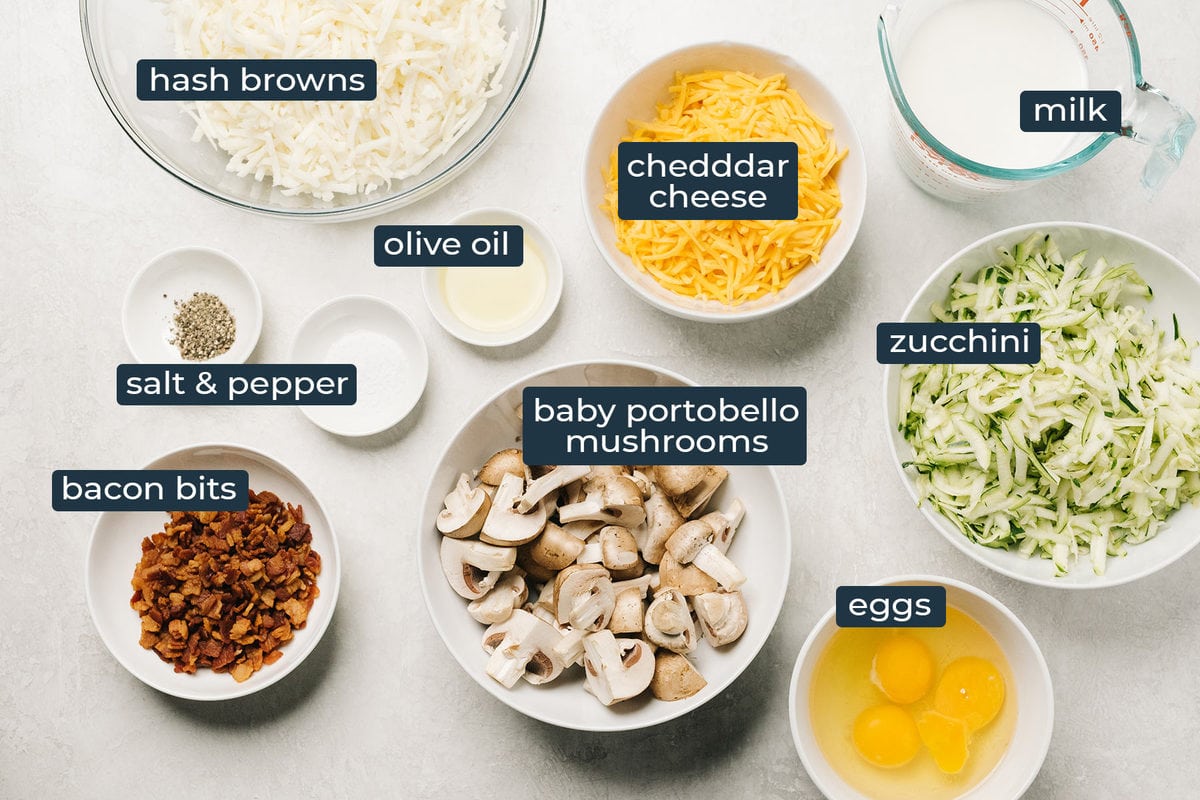 Ingredients to make hash brown breakfast quiche in prep bowls.