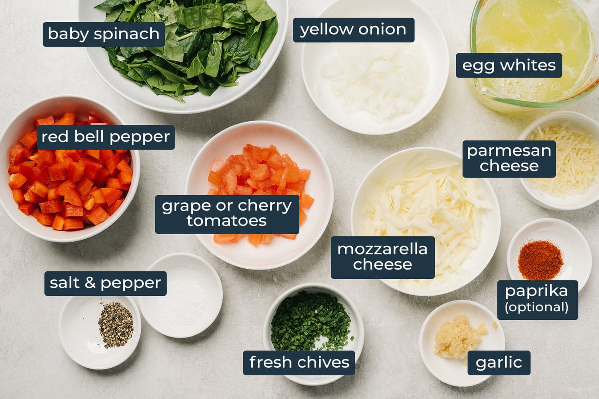 Ingredients to make healthy egg white muffins in prep bowls.