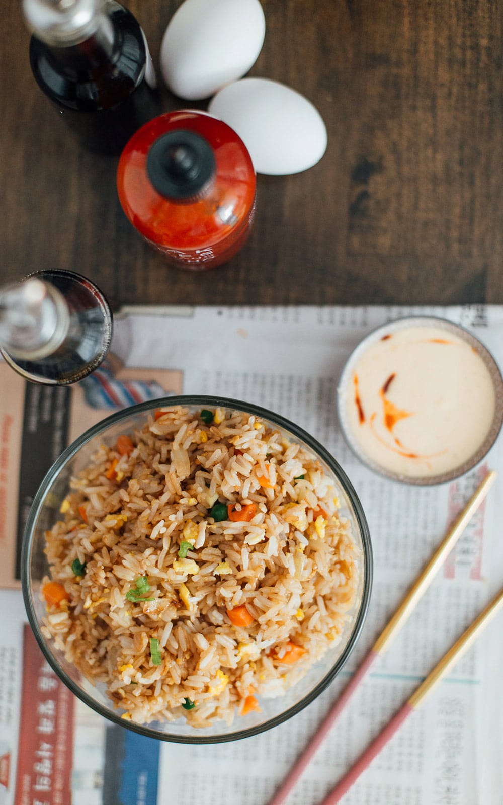 Hibachi rice with ingredients and Yum Yum sauce.