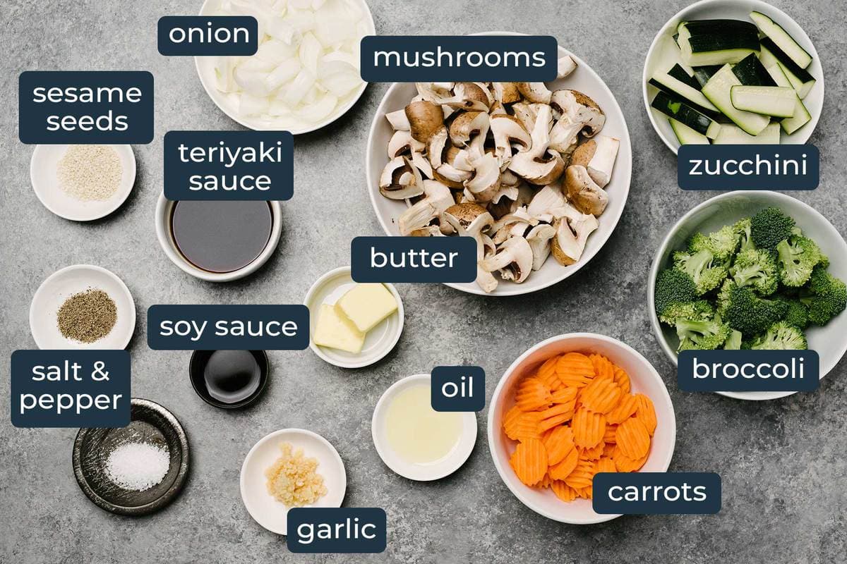 Ingredients to make hibachi vegetables in prep bowls.