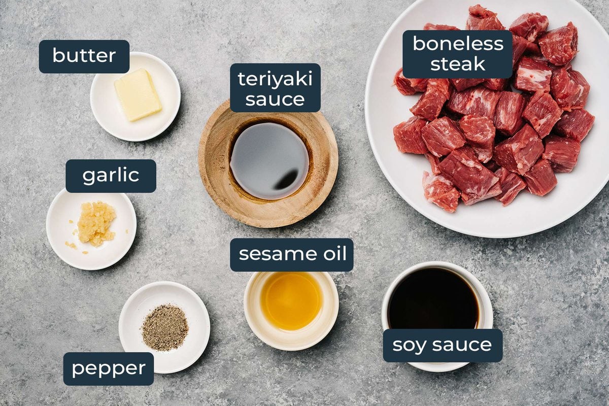Ingredients to make hibachi steak in prep bowls.