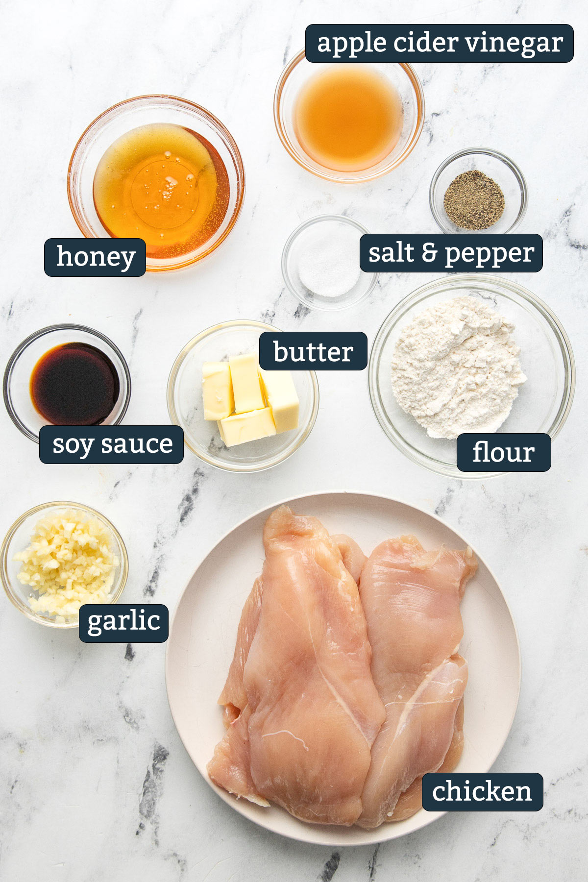 Ingredients to make honey garlic butter chicken in prep bowls.