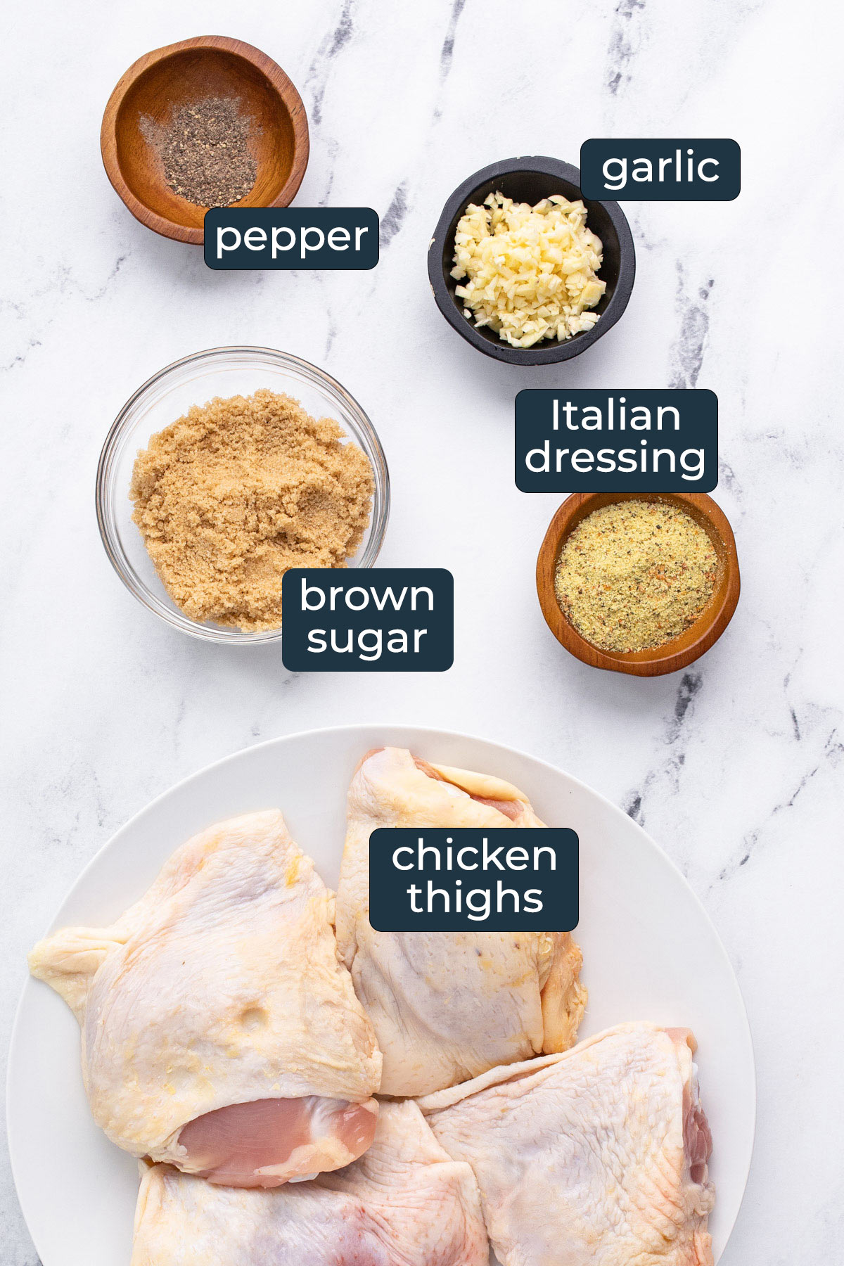 Ingredients to make slow cooker brown sugar garlic chicken in prep bowls.
