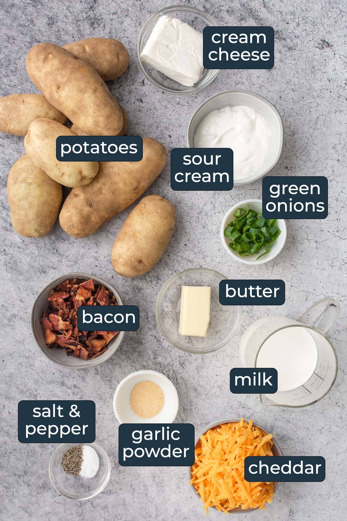 Ingredients to make twice baked potato casserole in prep bowls.