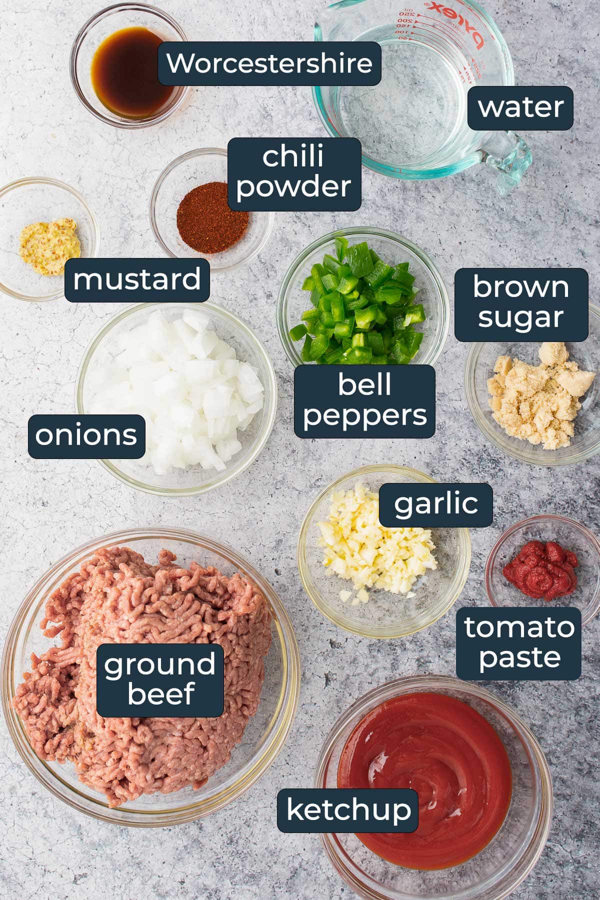 Ingredients to make homemade Sloppy Joes in prep bowls.