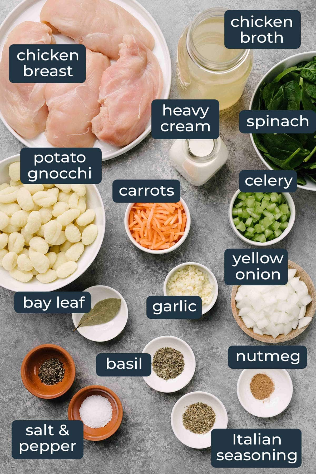 Ingredients to make slow cooker chicken gnocchi soup in prep bowls.
